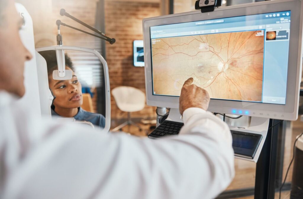 An optometrist discusses the findings of their patient's retinal photos from their routine eye exam.